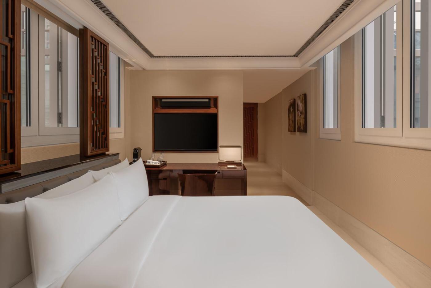The Capitol Kempinski Hotel Singapur Exteriér fotografie A bedroom at the hotel